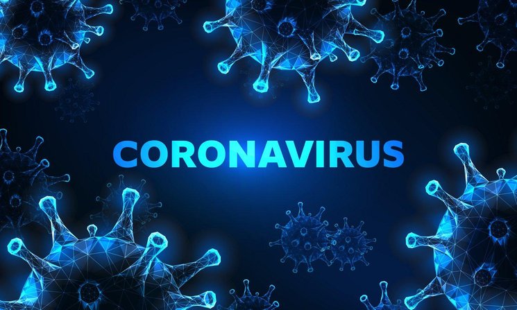 Corona Viren und Schriftzug. Foto: Inna/AdobeStock